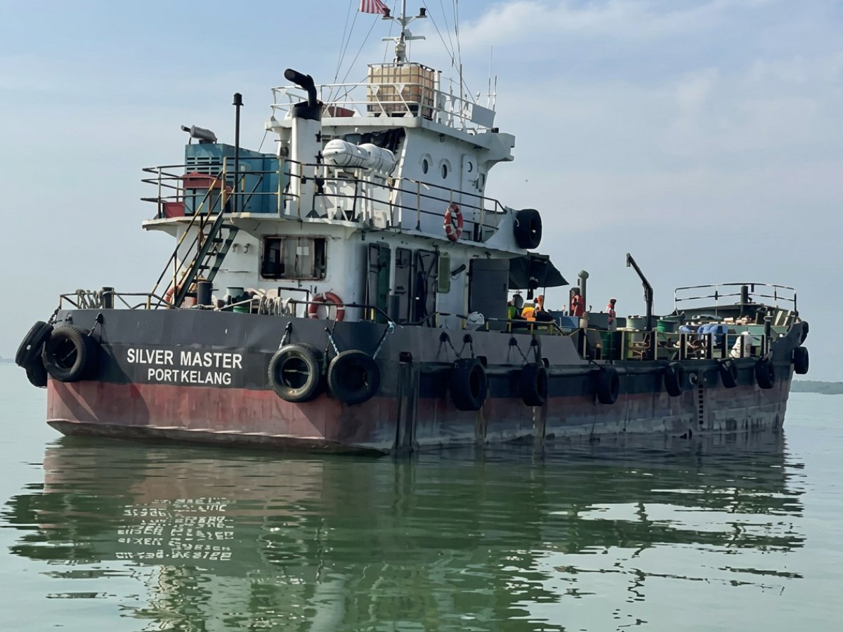 A classed passenger ferry in operation near a Malaysian island